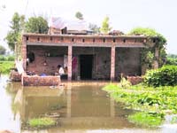 Belongings kept on the rooftop of a house in Fazilka.