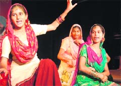 Girls perform giddha during a function organised to mark National Sports Day by Sarhad-e-Punjab Sports Club at Virsa Vihar in Amritsar