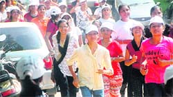 Students of Government College for Girls, Sector 42, participate in a run-for-fun to mark the celebrations of the National Sports Day in Chandigarh on Monday. 