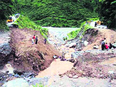 A road stretch washed away at Haradia in the Munsiyari subdivision of Pithoragarh district. 