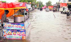 A flooded street in Palwal after a rainy spell.