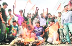 Activists of the Bajrang Dal hold a protest in Jammu