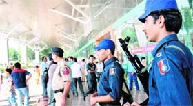 Security personnel guard the entrance to the Chandigarh airport following a bomb hoax call on Tuesday.