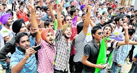Students canvass for their candidates during an election rally at Shri Guru Gobind Singh College in Sector 26, Chandigarh, on Tuesday.