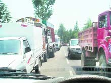 Traffic jams are regular on the highway at Ghuggar in Palampur because of encroachments on both sides of the road. 