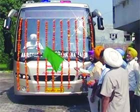 The new Punj-Aab bus being flagged off for Lahore from the international bus terminus in Amritsar on Tuesday