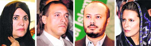 Libyan leader Muammar Gaddafis wife Safia, sons Hannibal and Mohammed, and daughter Aisha.