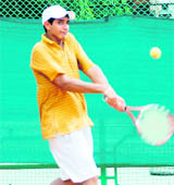 Prabhsimran S Bal plays a backhand during his match in the Manav Mangal AITA Talent Series Tennis Tournament at Panchkula 
