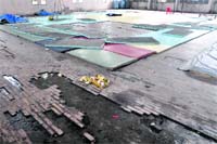 Damaged judo mats lying in the multipurpose indoor hall at Guru Nanak Stadium in Ludhiana. 