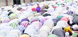 Muslim devotees offer prayers at a mosque near Arya College Road on the occasion of Eid in Ludhiana. 