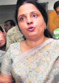 Jagruti Pandya, Haren Pandya's widow, addresses the media in Ahmedabad on Wednesday