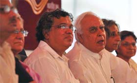 HRD minister Kapil Sibal with director R Govinda (3rd L) at the golden jubilee celebration of NCERT in New Delhi on Thursday.
