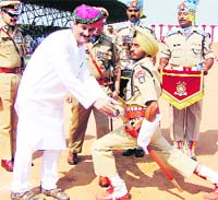 Union Minister of State for Home Affairs Jitender Singh presents the Sword of Honour to Paramjeet Singh, who was adjudged the all-round best trainee, at the passing-out parade of the 42nd batch of Direct-Entry Gazetted Officers at the CRPF Academy in Kadarpur, Gurgaon
