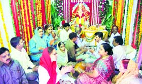 People pray to Lord Ganesha on the occasion of the Ganesha festival in Shimla on Thursday.