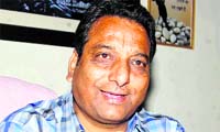 Vinod Chamoli, Mayor of Dehradun, addresses a press conference in Dehradun on Friday.