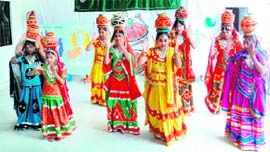 Students perform a dance in an inter-house dance competition organised by Delhi Public School in Dehradun on Friday.