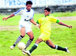 A match between Wills Youth Club (in white) and Gypsy Young (in yellow) in the Lala Nemi Dass Memorial District Football League played at the Pavilion ground in Dehradun on Friday.