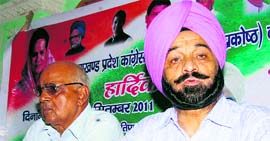DS Mann, state president of the intellectual cell of the Uttarakhand Congress, addresses a press conference in Dehradun on Friday.
