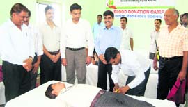 A volunteer donates blood at Roorkee on Friday.