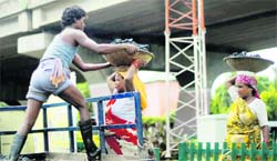 MC workers engaged in the cleaning of sewerage at Dogra Chowk in Jammu.