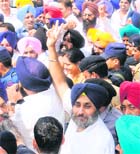 A jubilant Deputy CM Sukhbir Badal with party workers outside the office of the Gurdwara Election Commission.