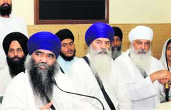 Sant Samaj leaders at a press meet in Chandigarh on Friday. 