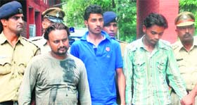 The accused in police custody at the Mani Majra police station in Chandigarh on Saturday.