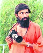 File photo of Raj Kishan Nain, an eminent photojournalist of Haryana.