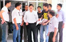 Suspended AIG KK Indoria comes out of the Regional Hospital in Kullu on Saturday.
