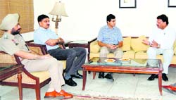 Raj Kumar Verka (extreme right), vice-chairman, National Commission for SC/ST, holds a meeting with officials of the district administration and police in Amritsar 