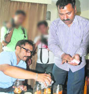 A health team takes samples of eatables in which a cockroach was found at Hotel Leo Forte in Jalandhar on Saturday. 