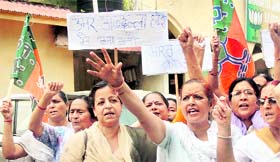 Activists of the BJP Mahila Morcha hold a protest in Jammu on Saturday. 
