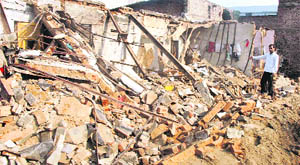The collapsed roof of the dwelling units at Kal Sarak in Ludhiana. 