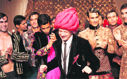 Male models display Rohit Bals (in pink turban) collection