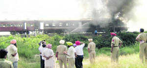 The engine of the Hoshiarpur-bound train that caught fire near the Dilwan Railway Station on Saturday. 