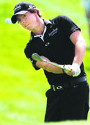Rory McIlroy chips during the third day of the European Masters in Crans-Montana on Saturday. 