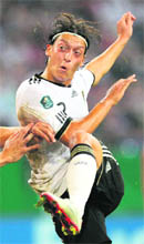 Germany's Mesut Oezil scored 2 goals as the team won 6-2. 
