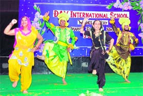 Students of DAV International School perform bhangra during the Teachers Day celebrations in Amritsar on Sunday