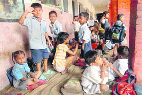 Schoolchildren sit in verandahs due to lack of classrooms at Government Primary School, Palsora, Chandigarh