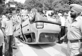 A car that met with an accident at Sheranwala Gate Chowk in Patiala. Two persons were injured in the mishap