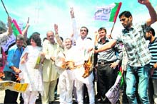 Members of the Panthers Party hold a protest against any move to grant autonomy to the state, in Jammu on Sunday.