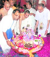 Devotees perform ‘Nauka Vihar’ to mark Radhashtami at Hare Krishna Dham in Sector 36-B, Chandigarh, on Monday.