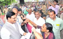 Chief Minister Ramesh Pokhriyal Nishank listens to the grievances of people at Roorkee on Monday. 