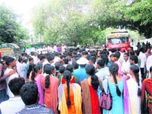 College students block traffic at Majra, near Rewai.