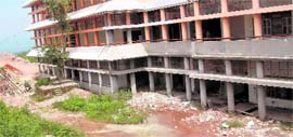 A pool of dirty water in front of the under-construction academic block of Jawaharlal Nehru Enginering College in Sundernagar.