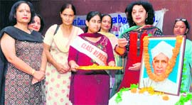 Students and staff of Government College for Women, Parade, in Jammu pay tributes to Dr S Radhakrishnan.