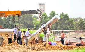 Work in progress at Olympian Prithpal Singh Hockey Stadium at the PAU in Ludhiana on Monday