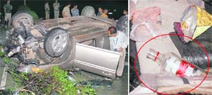 A rashly driven Hyundai Verna car (CH 04 J 9550) overturned on the road separating Sectors 16 and 10, near Government Multi-Speciality Hospital, Sector 16, in Chandigarh on Monday; and (right) an empty liquor bottle lies beside a packet of snack in the car.