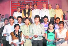 Newly elected office-bearers of the DAV College Student Council take the oath of office at a function at the college in Dehradun on Tuesday. 