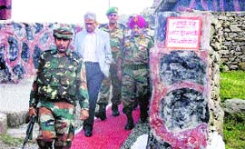 Defence Secretary Shashikant Sharma along with Army officers at a forward post in the Bhimber Gali sector in Jammu on Tuesday.